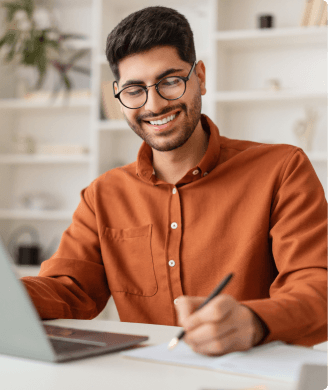 Smiling student holding books - testimonial